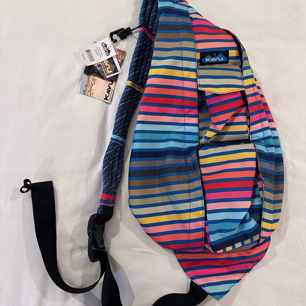 Kavu rope sling pack and matching pouch. New with tags.